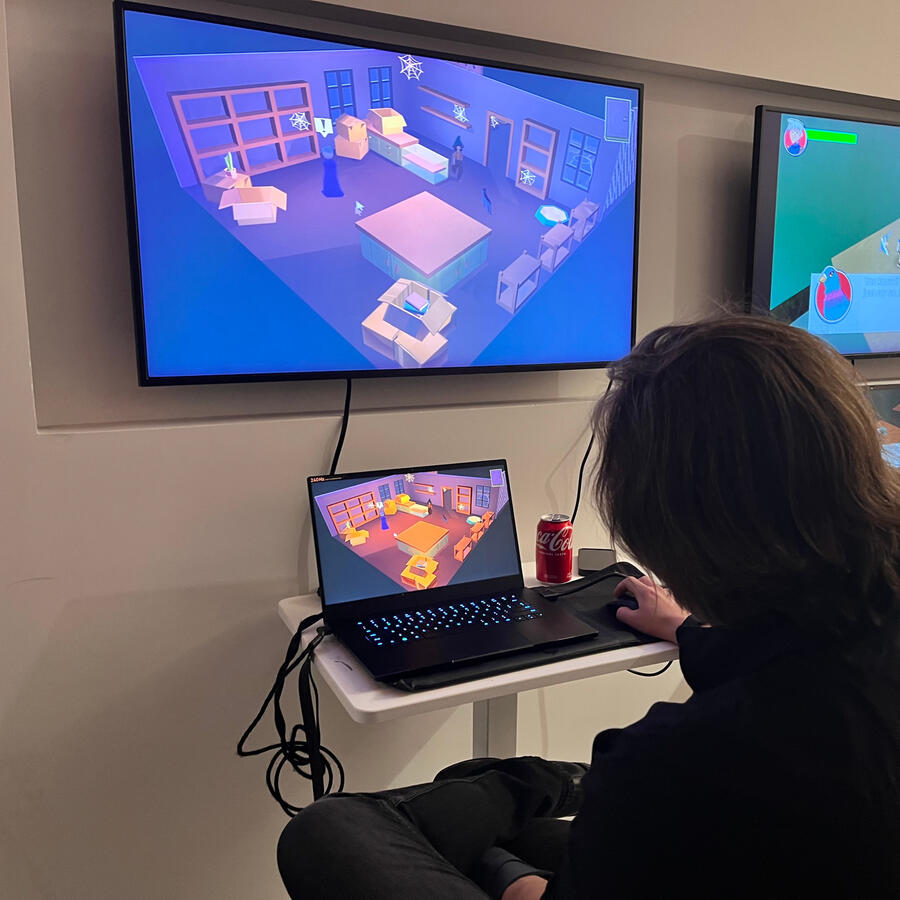 Michael Maurino playtests Gaia's Brewery at Pratt Institute.